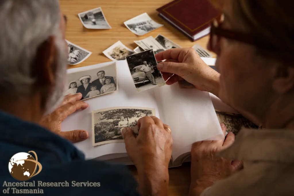 People Looking at Family History Book